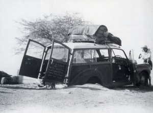 Alan Cooper's (East 1926) marooned car. Cooper, a failed Kenyan coffee planter and three associates set out in April 1955 from Nairobi in a Morris Traveller to drive across Africa, through the Sahara Desert and Europe to London.  The poorly planned expedition was to end in failure and his death