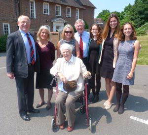 Pam, sons John and Richard, and three of the six grandchildren outside the home that was David and Pam's in the 1960s